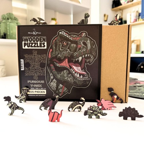 Nieregularne ksztalty elementow drewnianych puzzli z motywem dinozaura